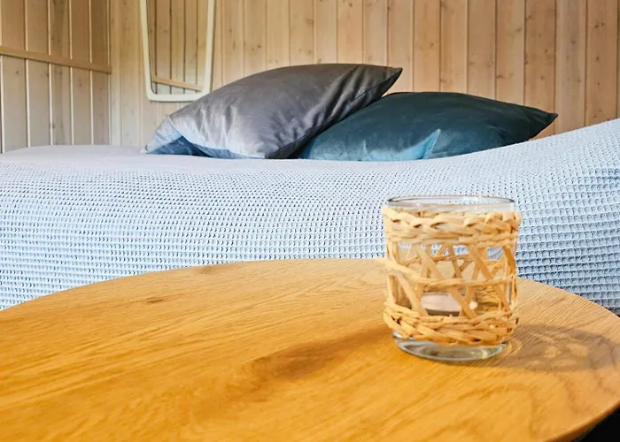 House In Nature By The Water At Lango Munkebo fotoğrafı